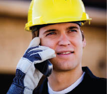 Image: Construction worker on phone
