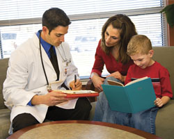 Image: Doctor with mother and child