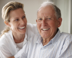 Image: Smiling woman and man