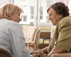 Image: Carer talking to woman