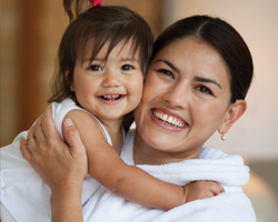 Image: Woman holding child
