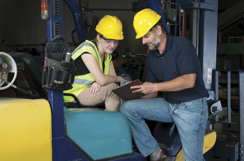 Photo: Two workers