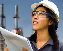 Image: Female worker taking notes