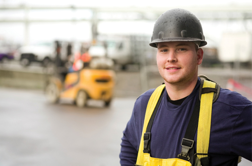 Photo: Male worker smiling
