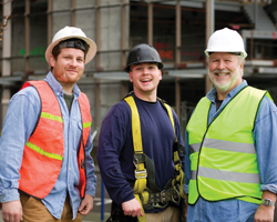 Image: Workers at building site.