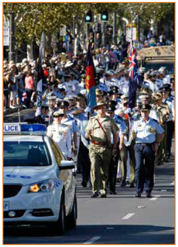 Photo of defence force personnel marching in a parade.